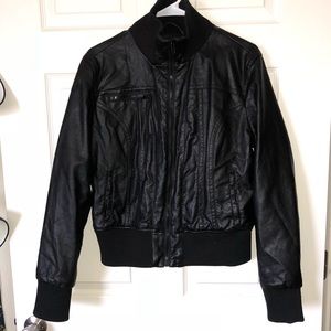 Leather jacket fits like adult S/M